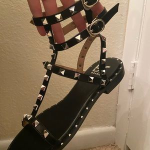 Black leather pyramid studded gladiator sandals